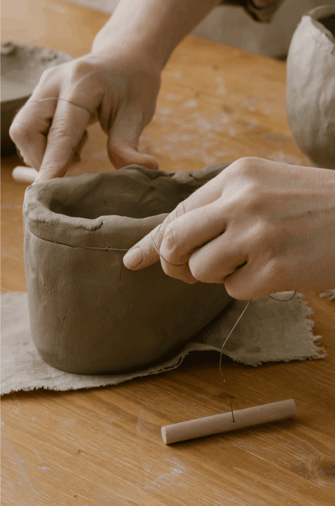 Hands modelling clay